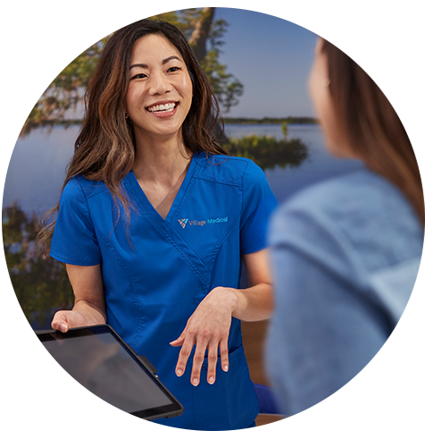 Smiling healthcare provider with a patient