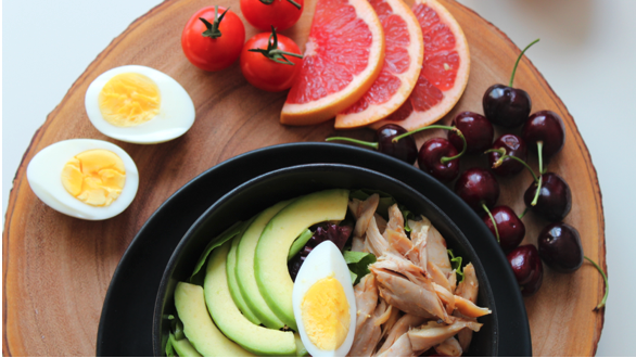 Healthy food for diet for Crohn’s Disease on a wooden platter