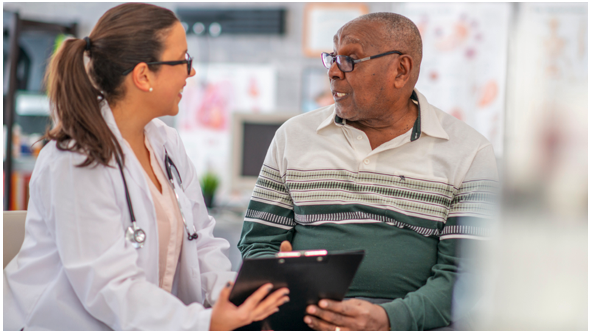 A man with questions to ask a doctor at a Village Medical location